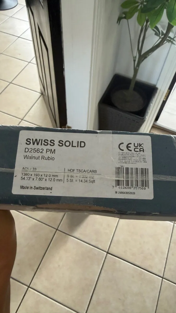 Walnut Laminate Flooring (7 Unopened Packs) - Image 1