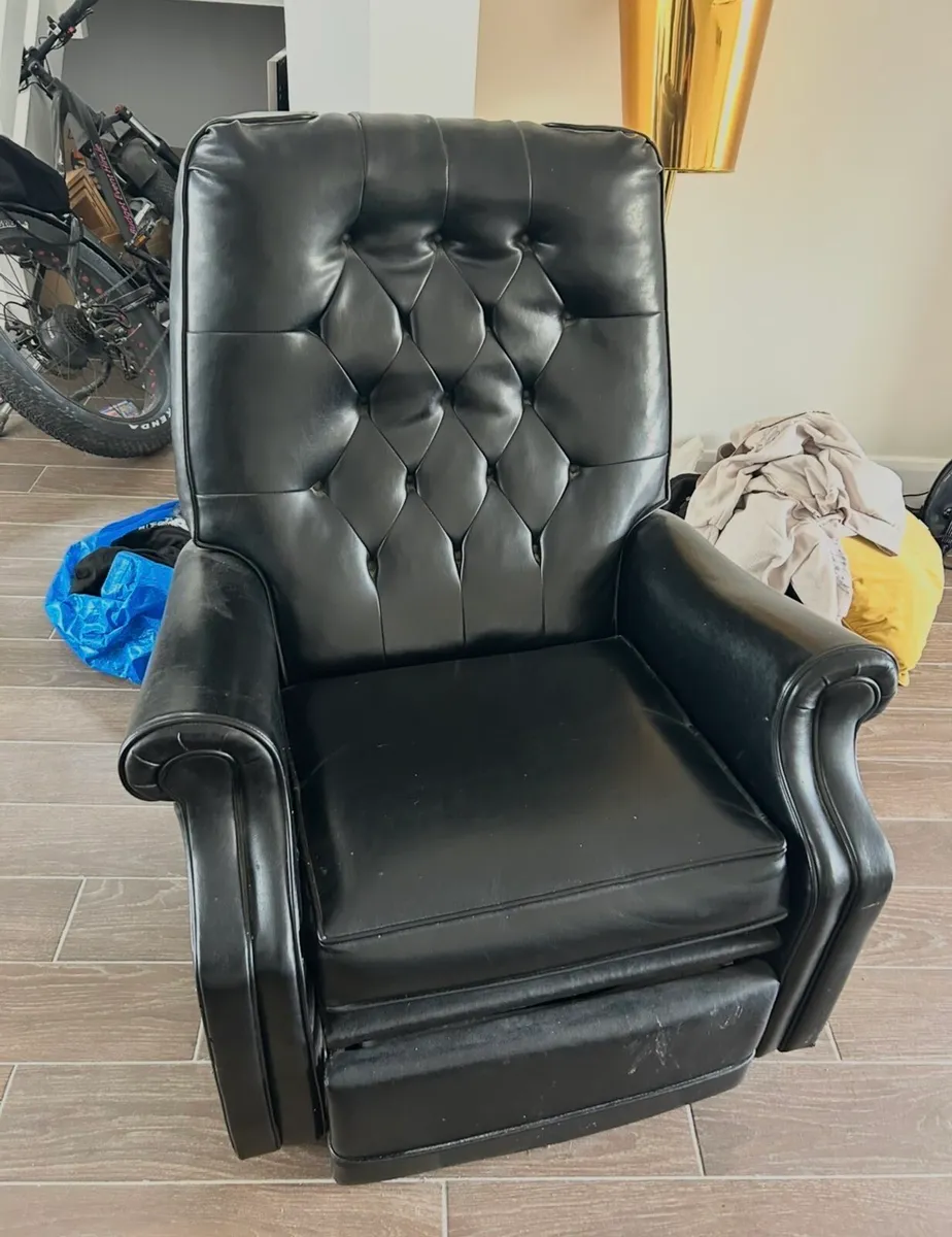 Leather arm chair free to go