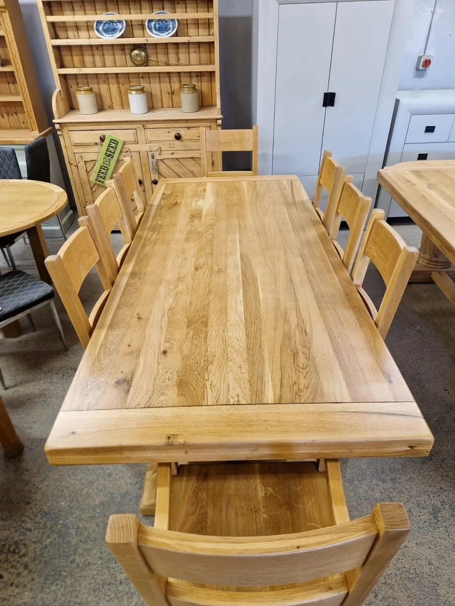 7ft, 8 inches oak trestle table, 8 oak chairs - Image 2