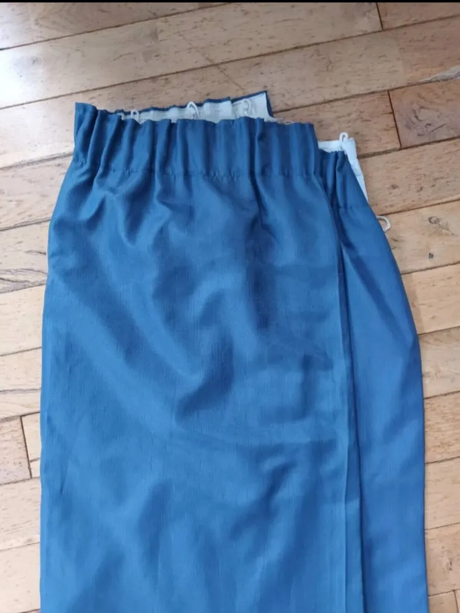 Blue curtains with black out lining - Image 1