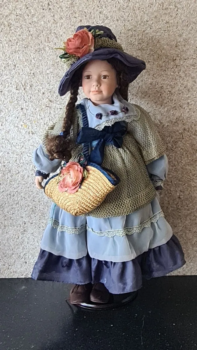 Collectible Porcelain Doll with Original Box - Image 1