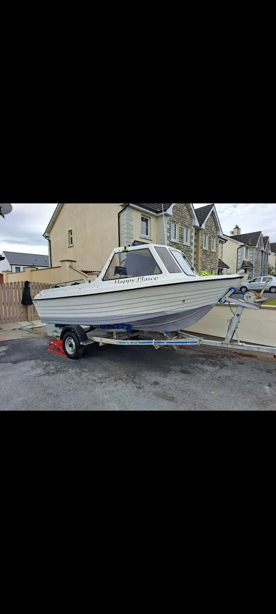 2004 explorer elite mercury 60hp roller trailer - Image 1