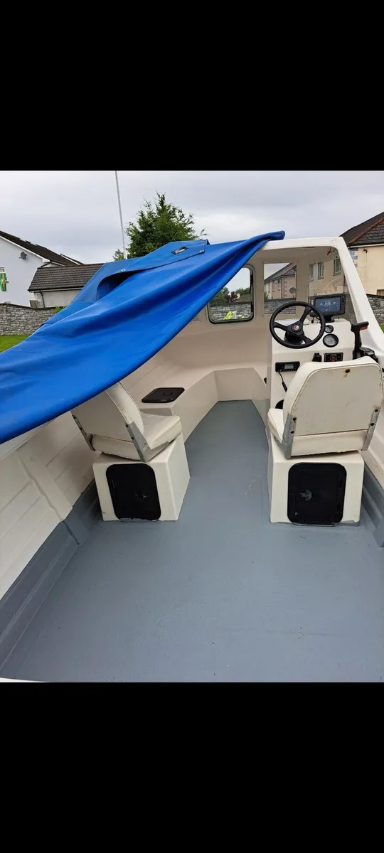 2004 explorer elite mercury 60hp roller trailer - Image 4