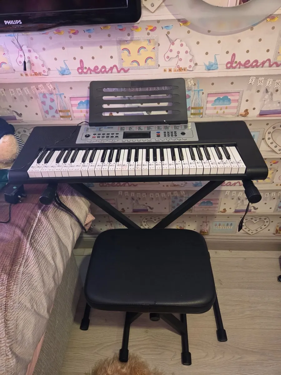 Keyboard with seat and stand