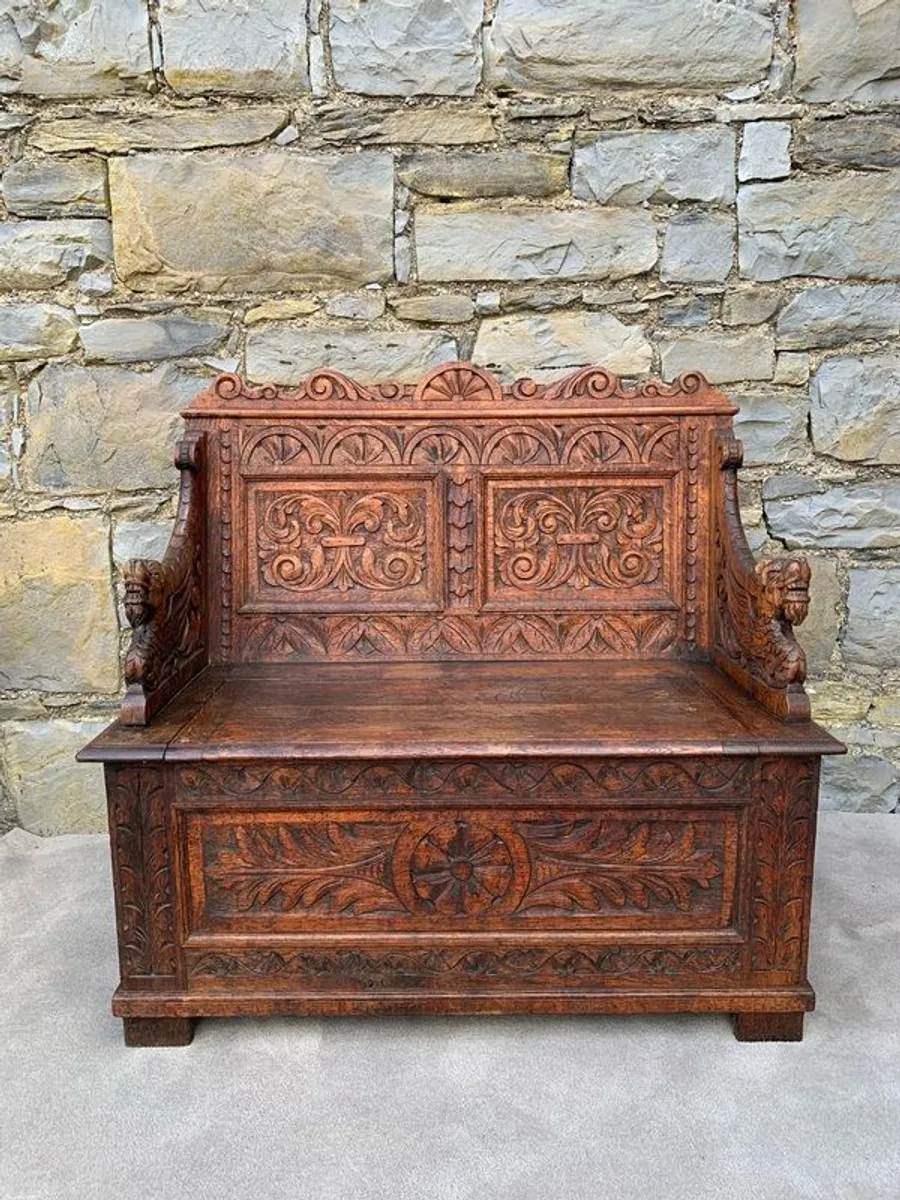 Late Victorian Gothic Revival Carved Oak Hall Settle. - Image 1