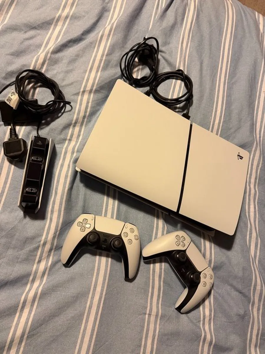 PS5 Bundle + 2 Controllers + Charging Dock + 4 Games - Image 1