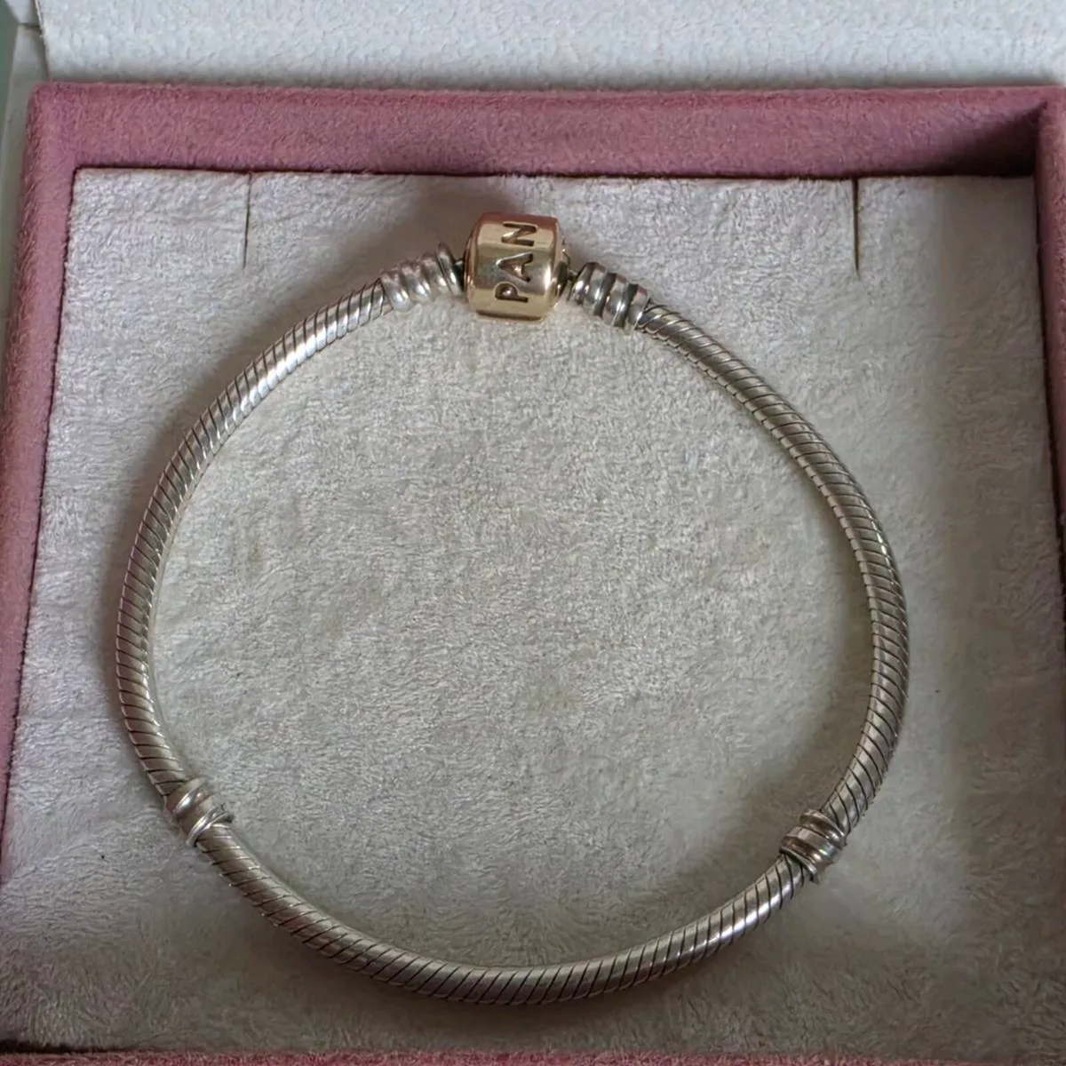 Pandora sterling silver bracelet with a 14k solid - Image 1
