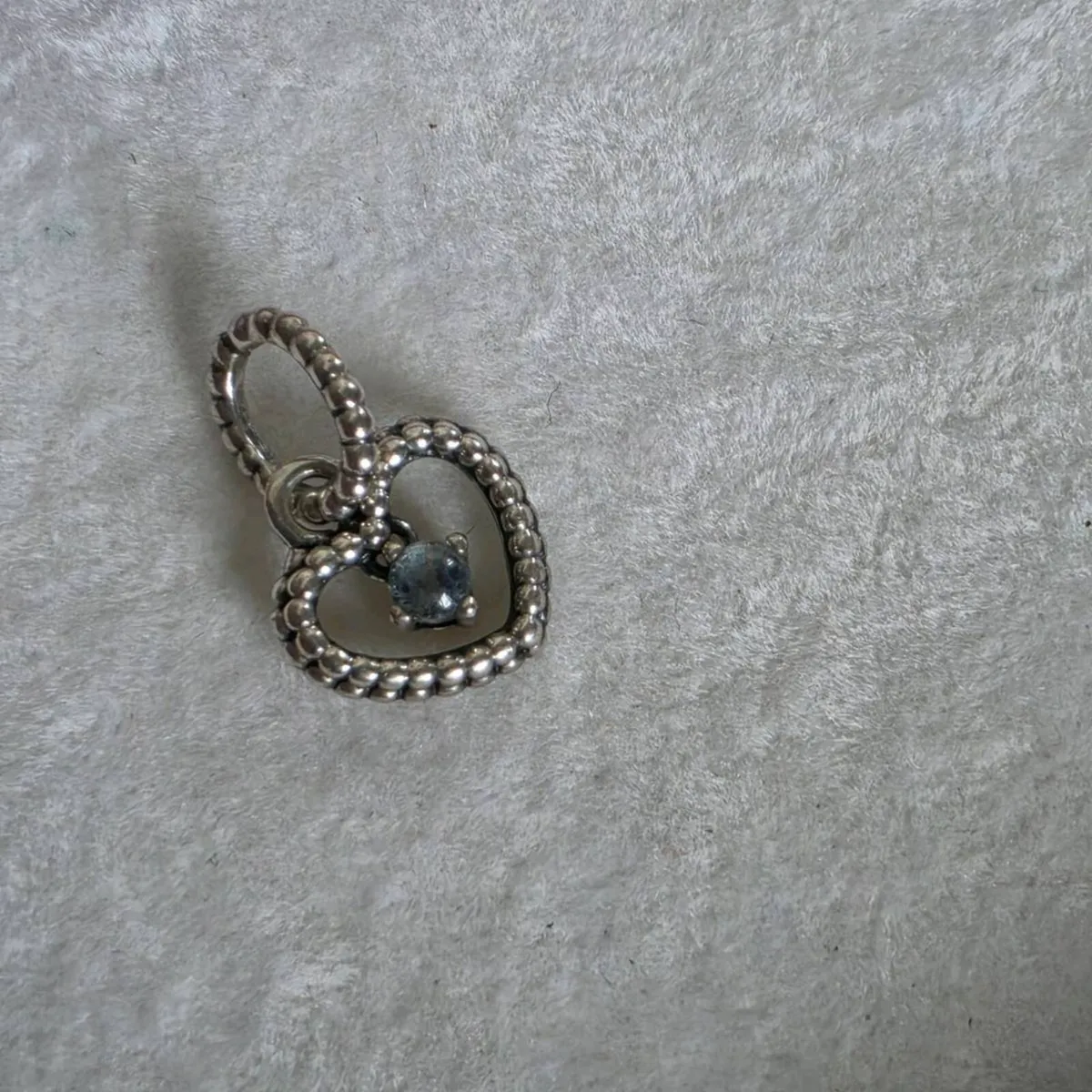 Pandora silver heart charm with blue gemstone - Image 1