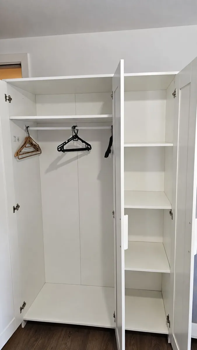 IKEA Brimnes 3-door wardrobe with mirror - Image 1