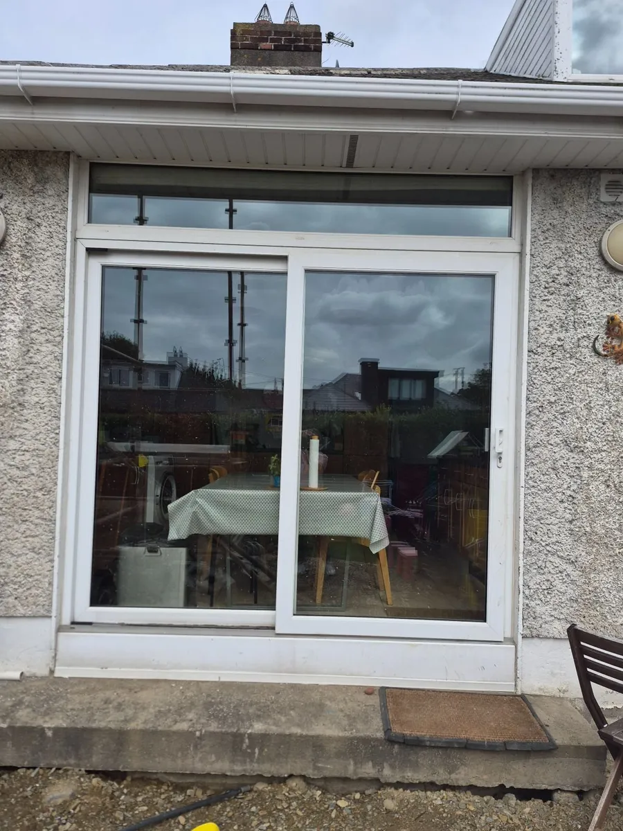 Fairco sliding door and transom window