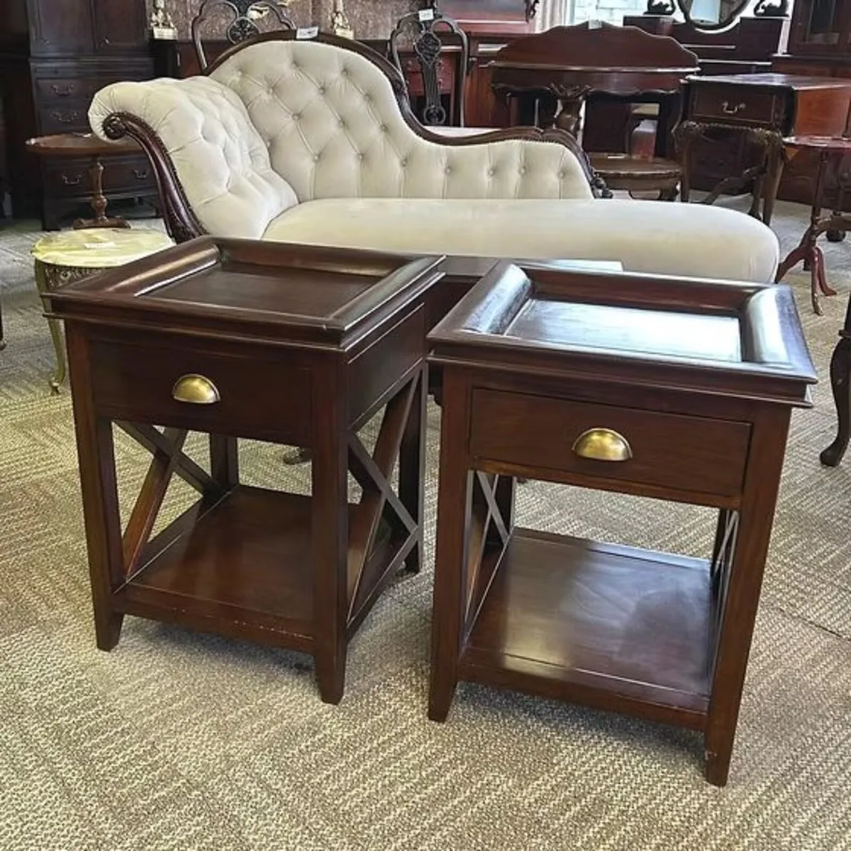 Handsome pair of mahogany side tables with recesse