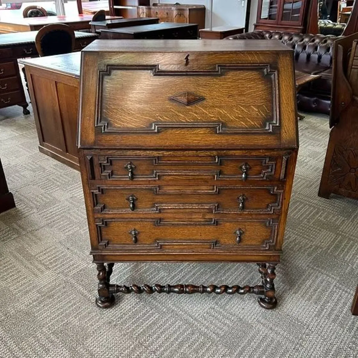 Handsome oak writing bureau with a panelled fall f