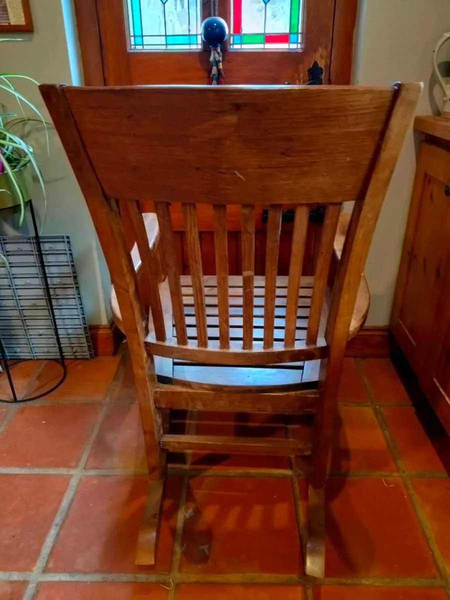 classic solid wood rocking chair with a slatted ba - Image 3