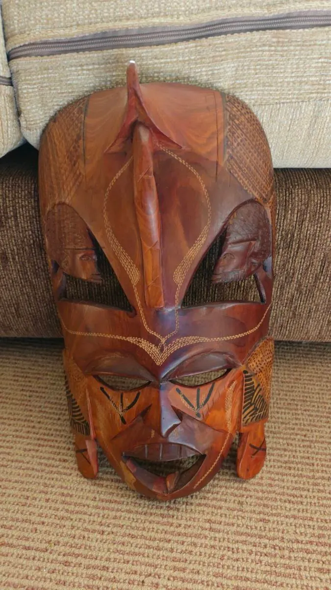 Hand-Carved African Wooden Wall Decor - Image 1