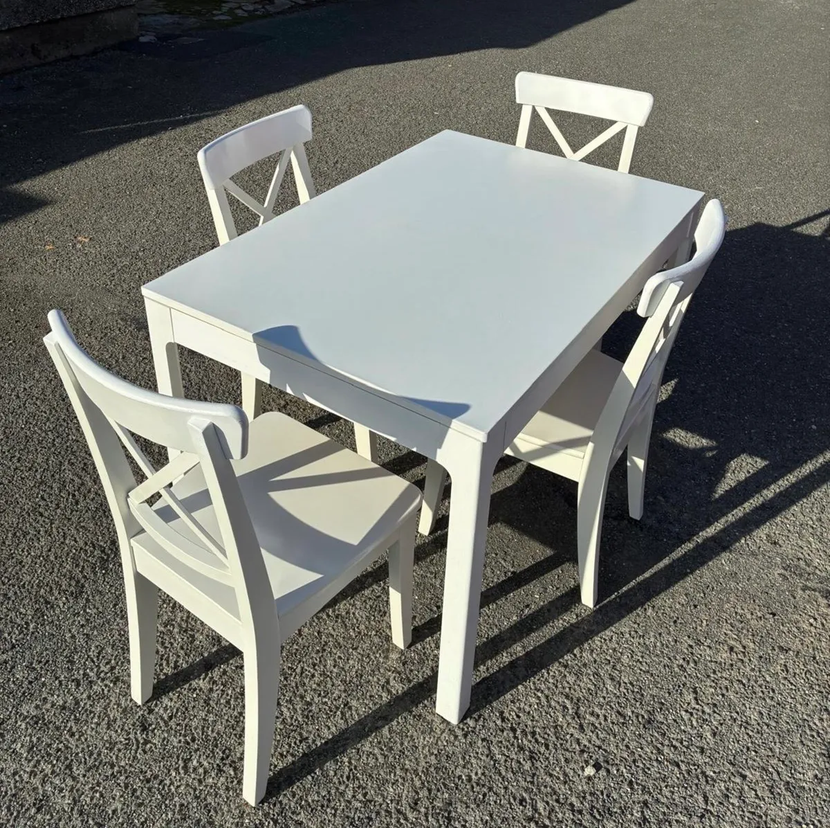 White extended Table & 4 Solid Chairs - Image 1