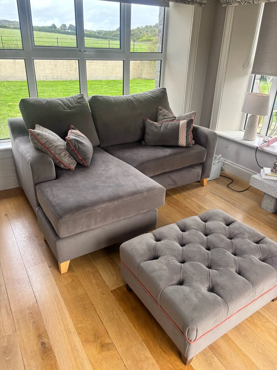 Grey 2 seater sofa with matching footstool - Image 1