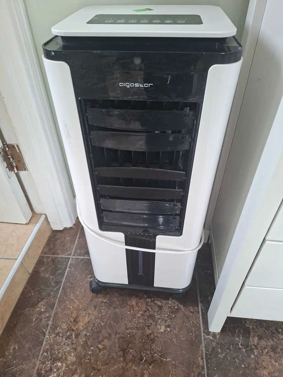 Air conditioner/purifier - Image 1