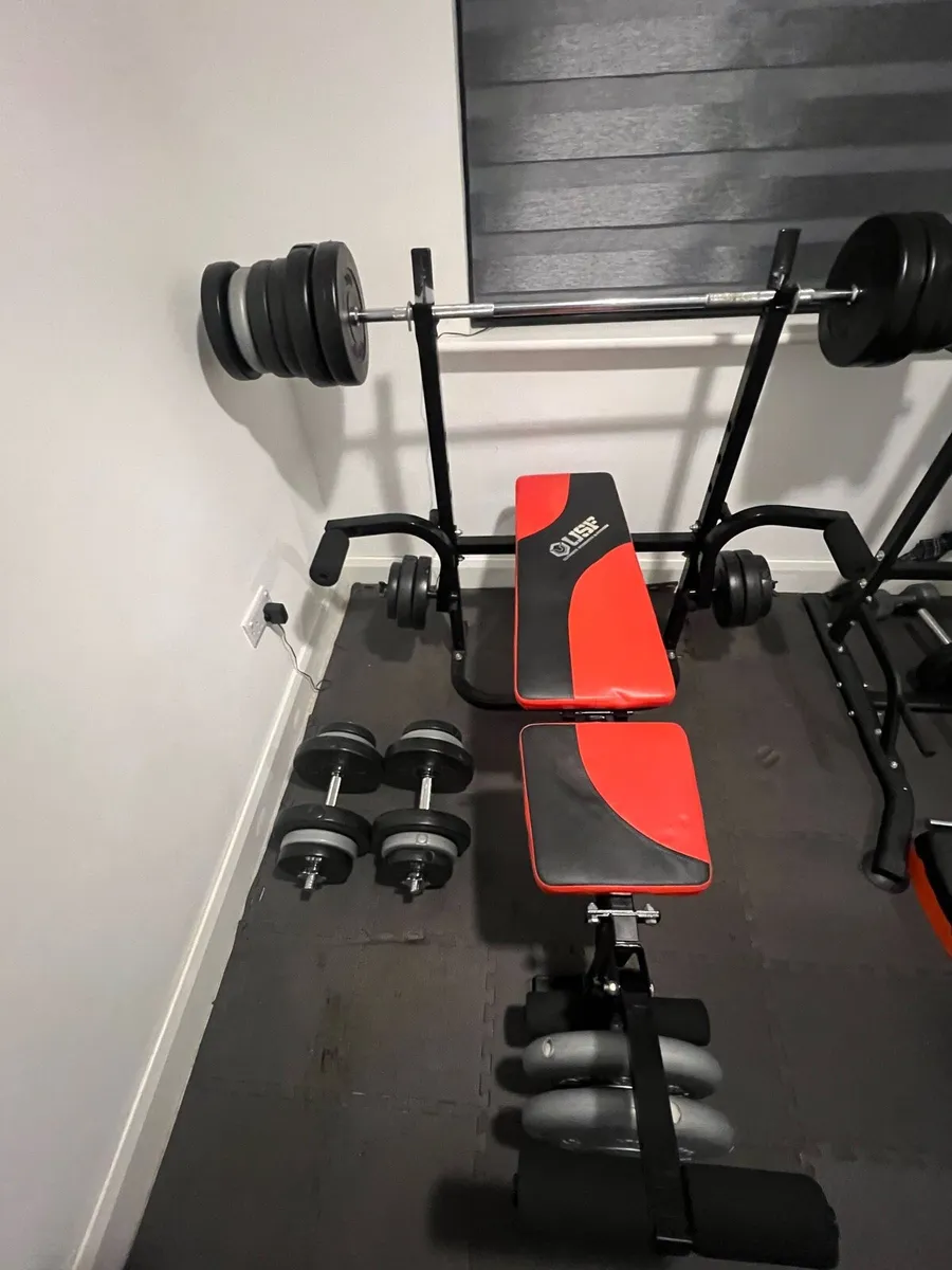 Home Gym Weight Bench and Weights - Image 1