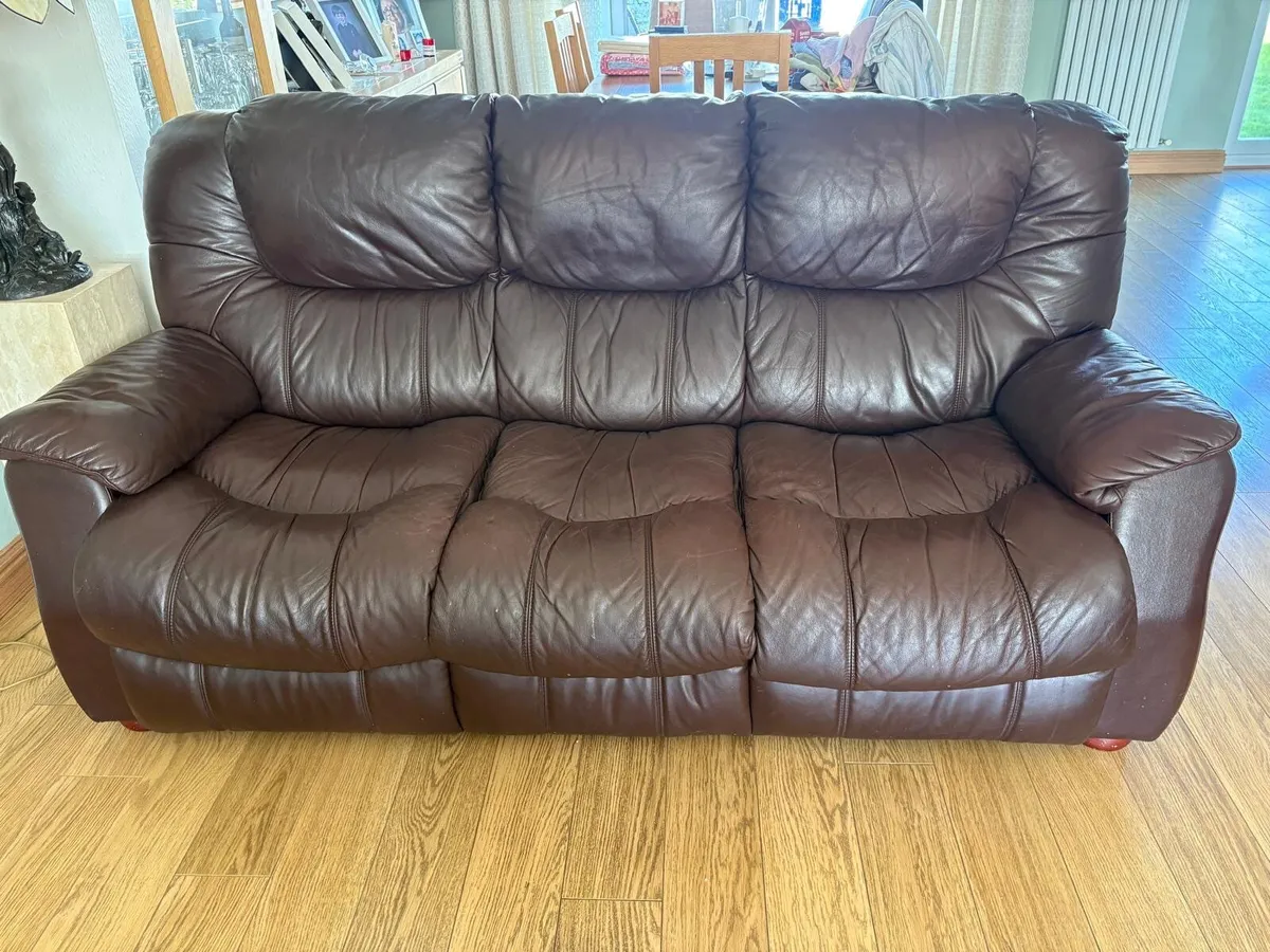 Brown leather three seater couch and armchair - Image 1