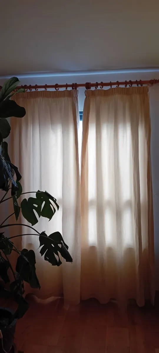 Cream curtains with wooden rail - Image 1
