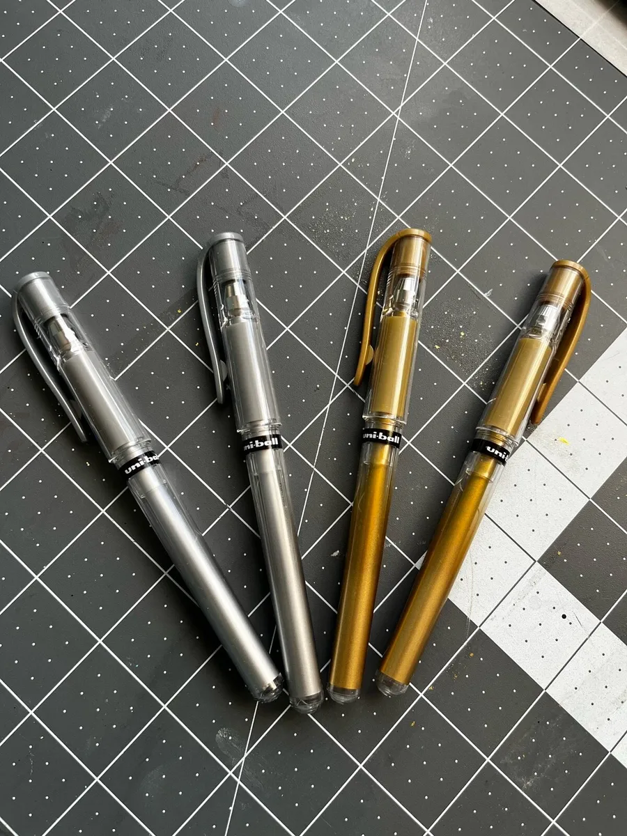 Four Uni Ball Signo Pens - Image 1