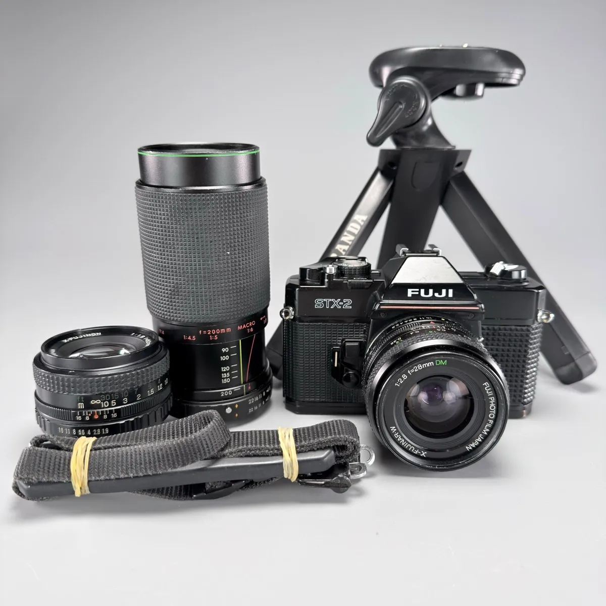Fuji STX-2 SLR 35mm film camera plus 3 lenses - Image 1