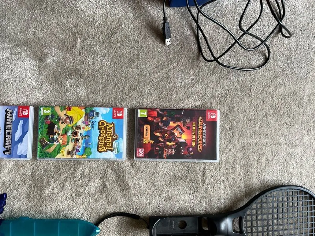 Nintendo Switch accessories and games. - Image 4