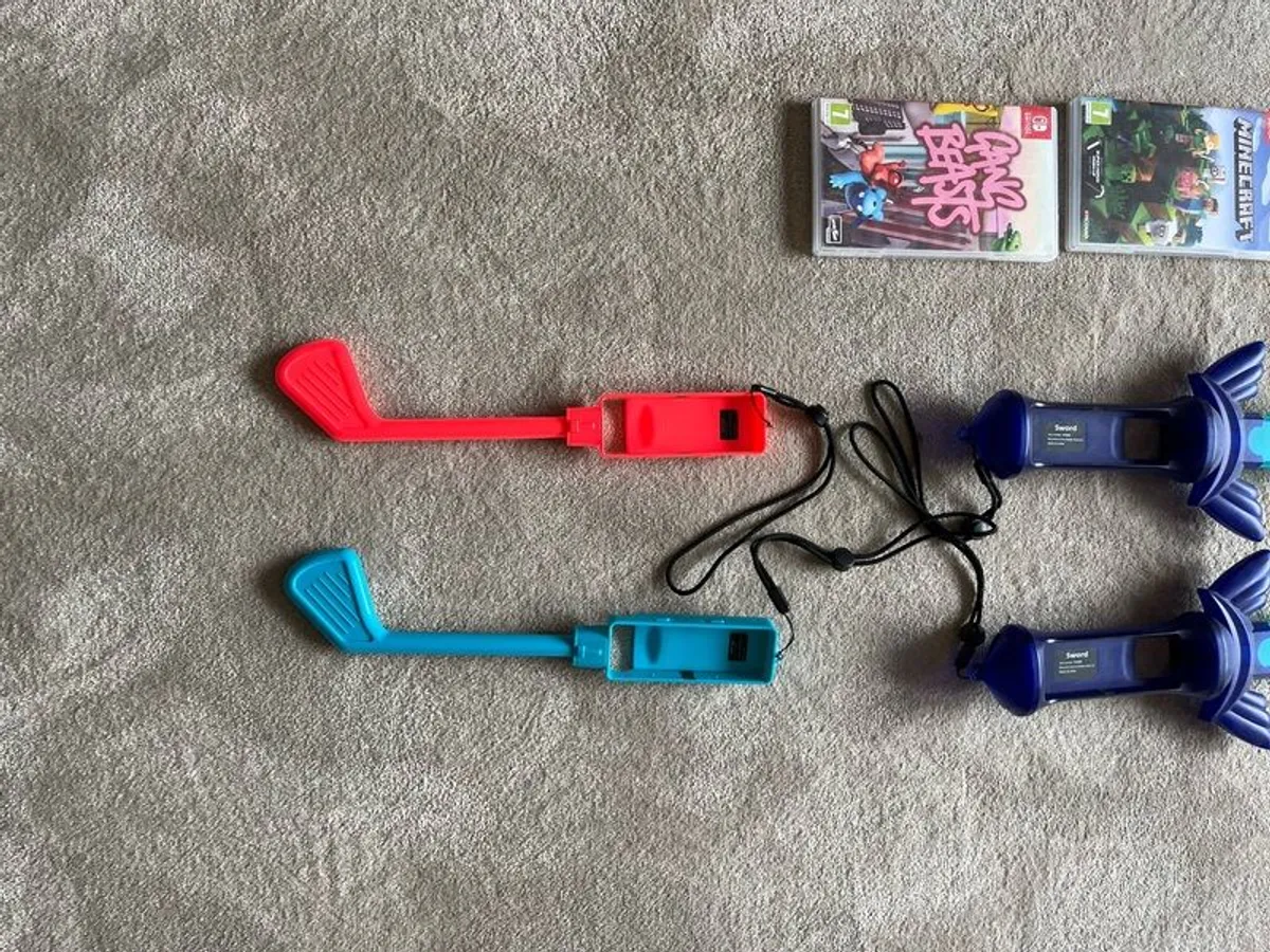 Nintendo Switch accessories and games. - Image 1