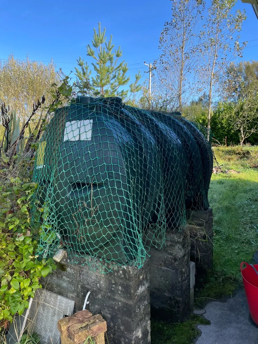 Heating oil tank with some oil inside - Image 1