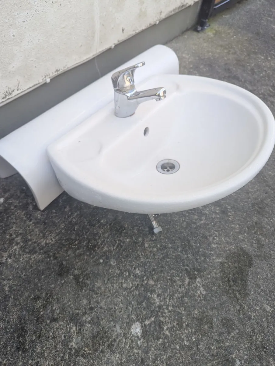 Bathroom sink, tap and pedestal