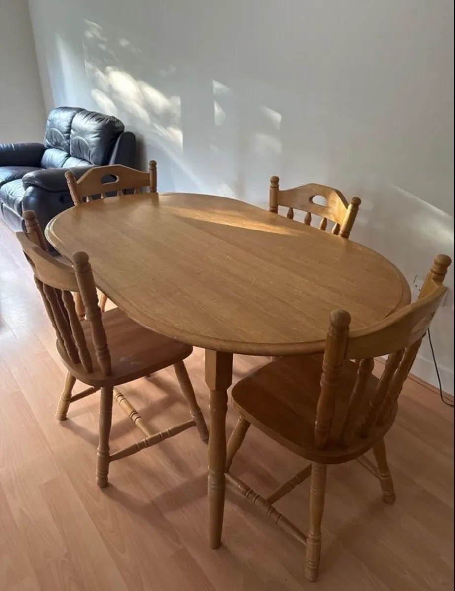 Sturdy wooden dining table and four chairs set - Image 1
