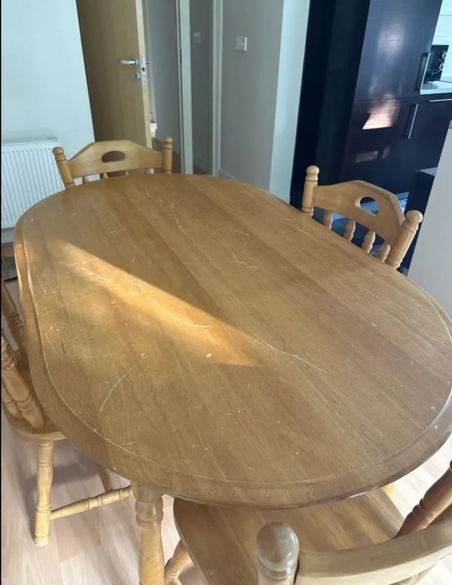 Sturdy wooden dining table and four chairs set - Image 4