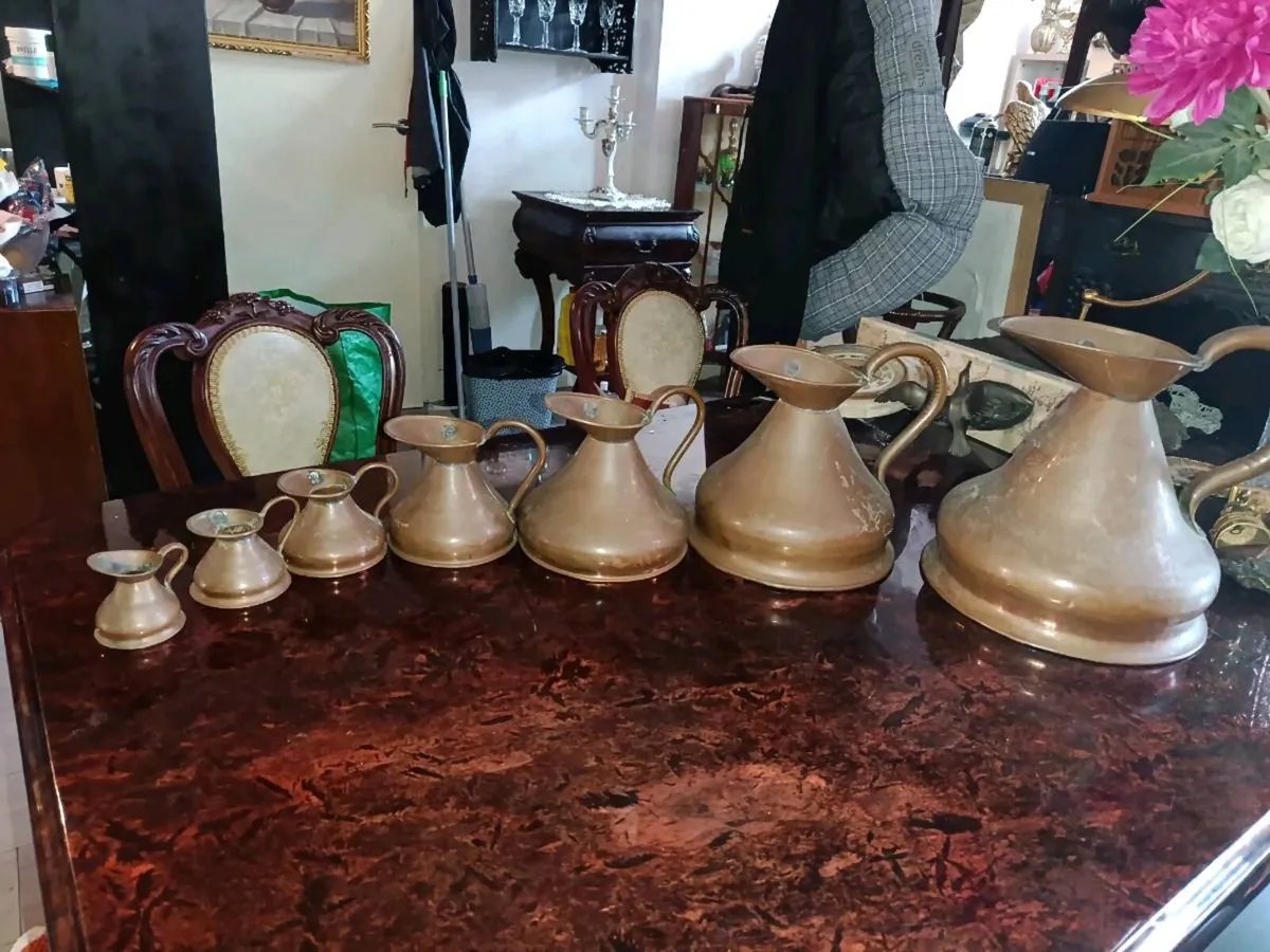 Antique Copper Haystack copper jug set of 7 - Image 1