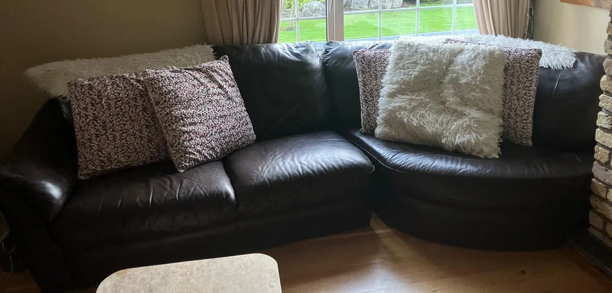 Brown leather 4 seater curved couch
