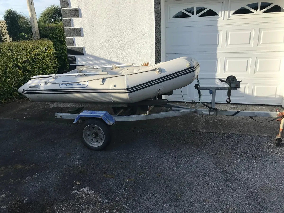 Inflatable boat & trailer. - Image 1