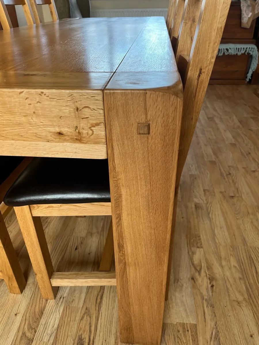Solid oak dining table with 8 matching chairs - Image 4