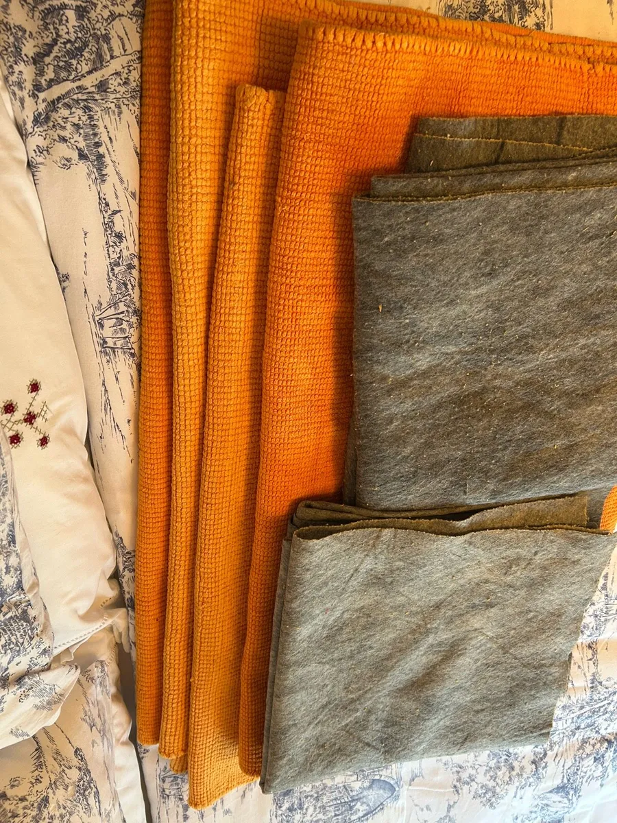 Orange ikea rugs x 4 with non-slip under lays. - Image 3