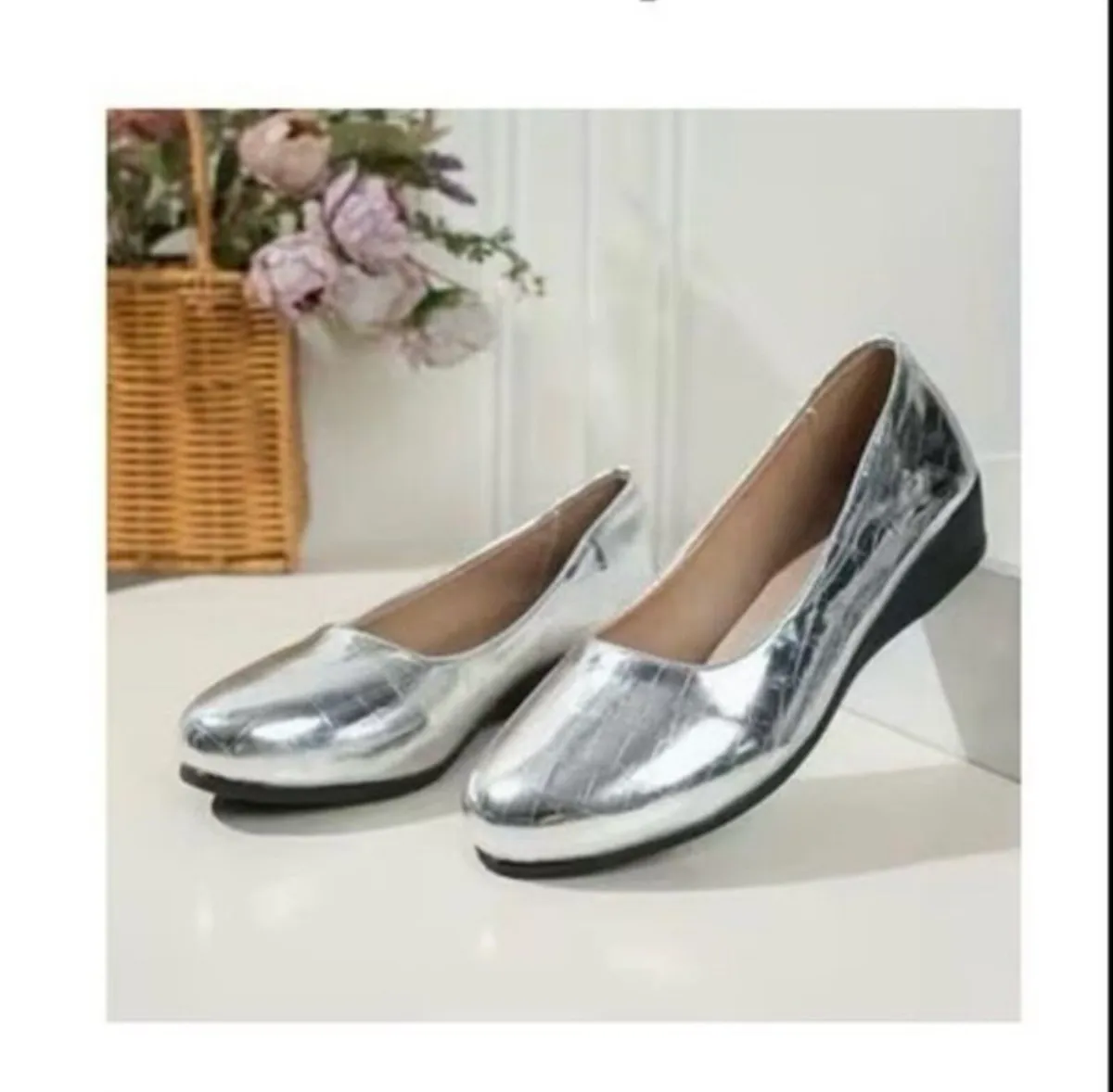 Brand New Low  wedge Silver shoe size 6.5