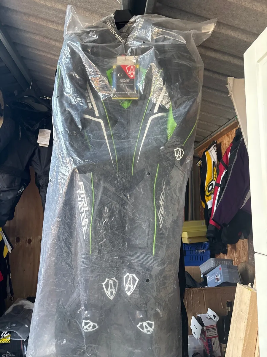 Motocross boots and clothing - Image 1