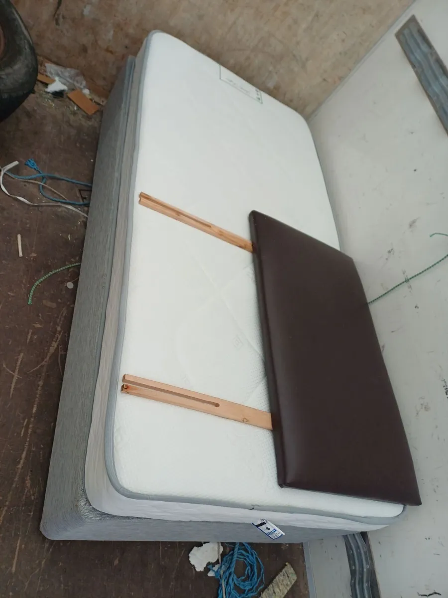 Single bed with mattress and headboard