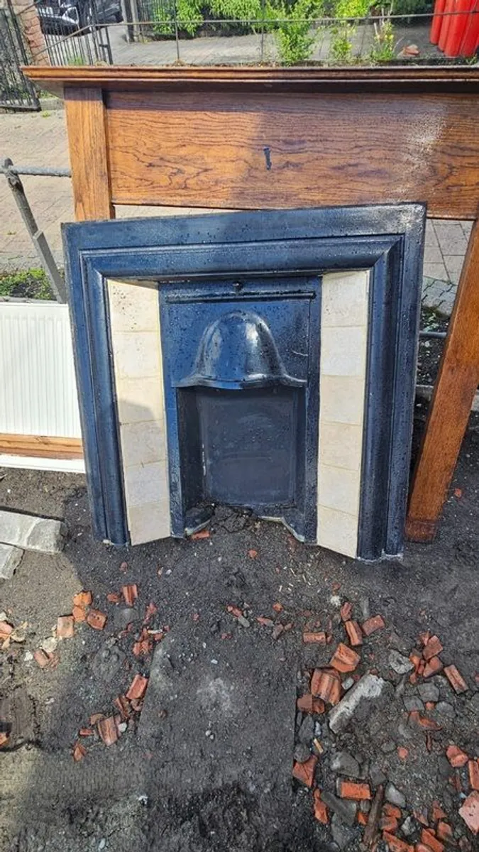 Metal and tiled fireplace with wooden mantle. With 4 panel internal door - Image 1
