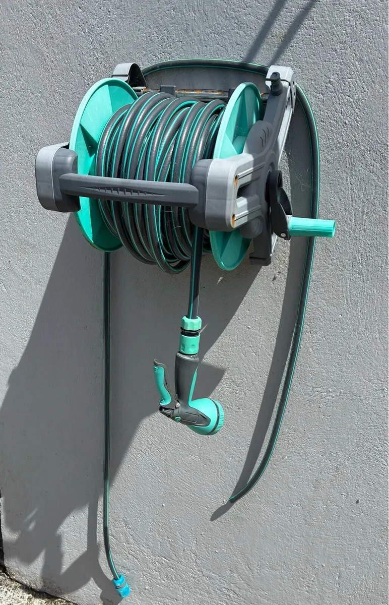 Garden hose with wall mount.