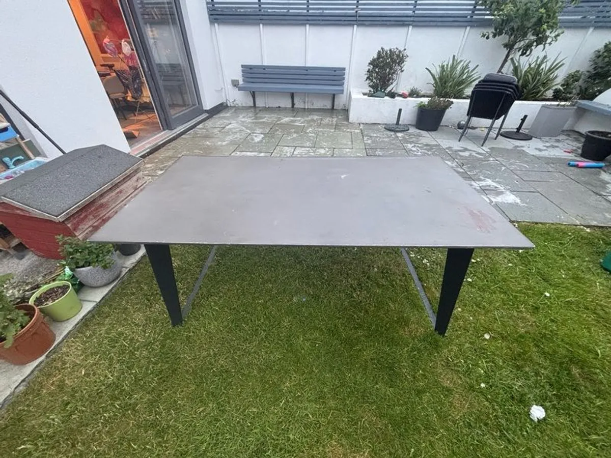 Large concrete resin topped table available free to take. - Image 1