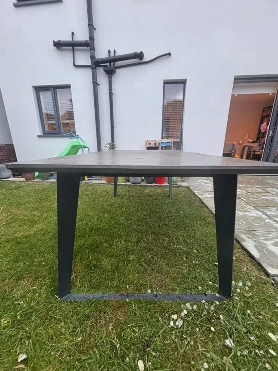 Large concrete resin topped table available free to take. - Image 2