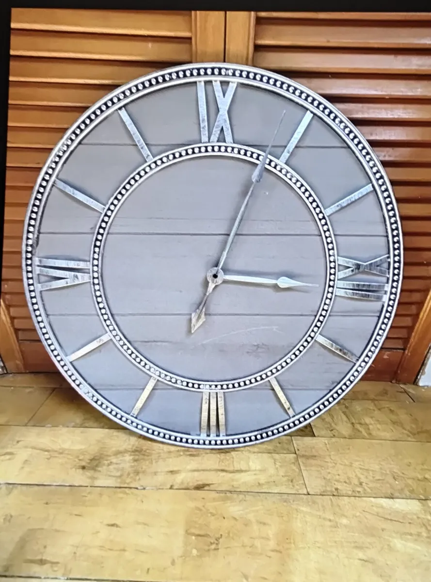 Silver antiqe clock
