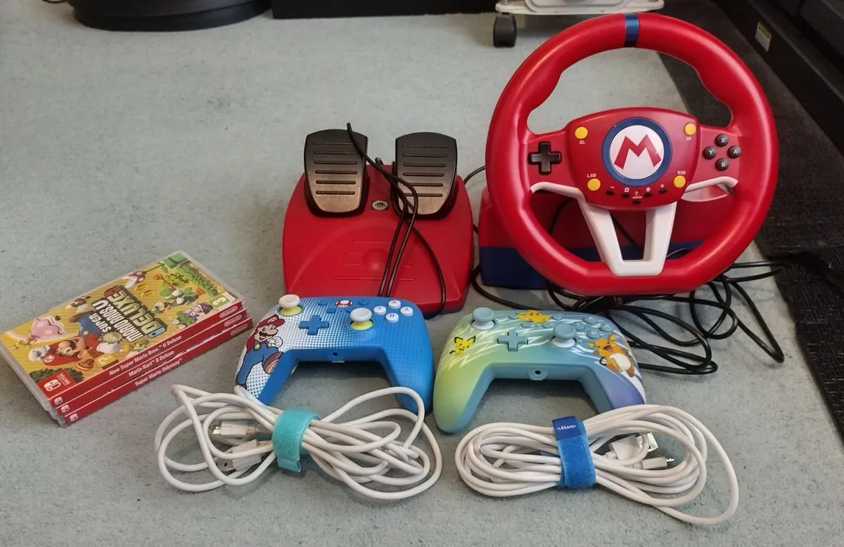 Nintendo Switch Ultimate Mario Bundle - Image 1