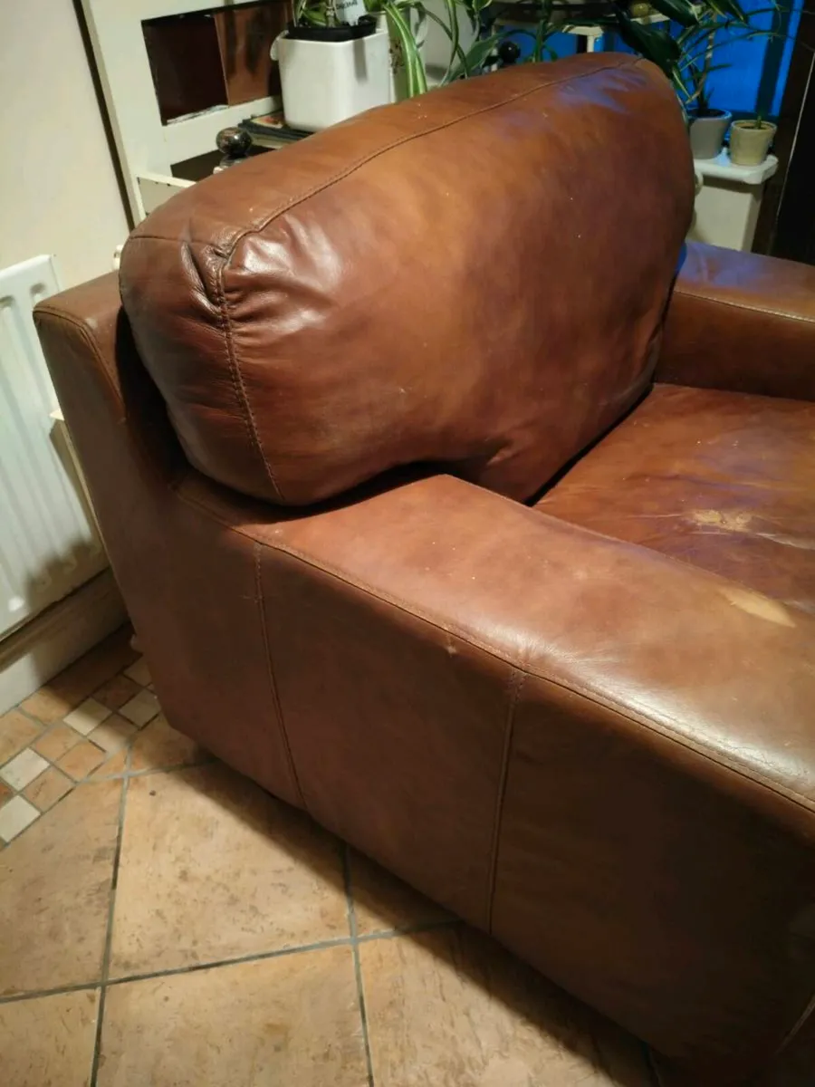 Real brown leather armchair featuring thick,  cush - Image 4