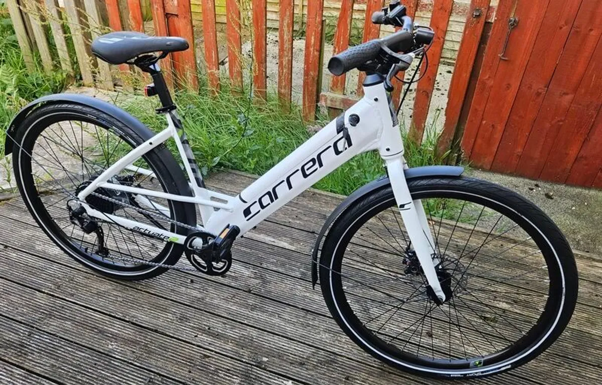 Brand new Carrera Actuate 2 Lowstep Electric Hybrid Bike - Image 1