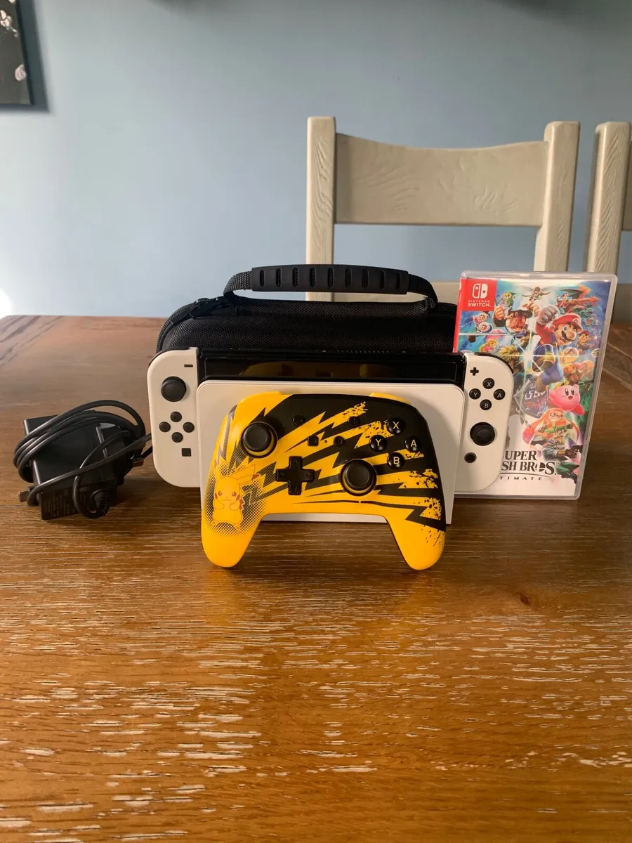 Nintendo switch oled+accesseries - Image 1
