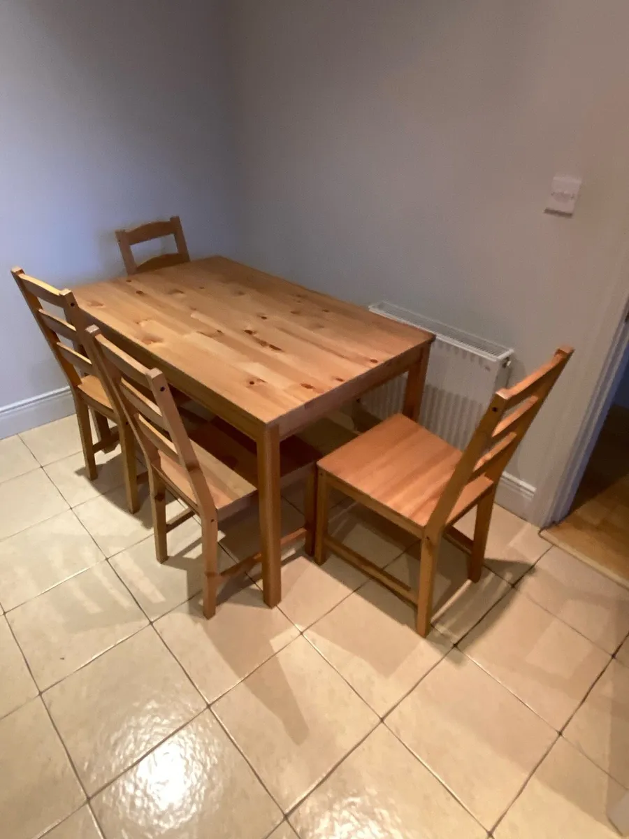 Wooden kitchen table and chairs - Image 1